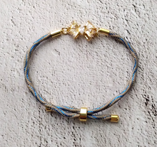 Kelly Jeweled Bow Metallic Corded Slider Bracelet