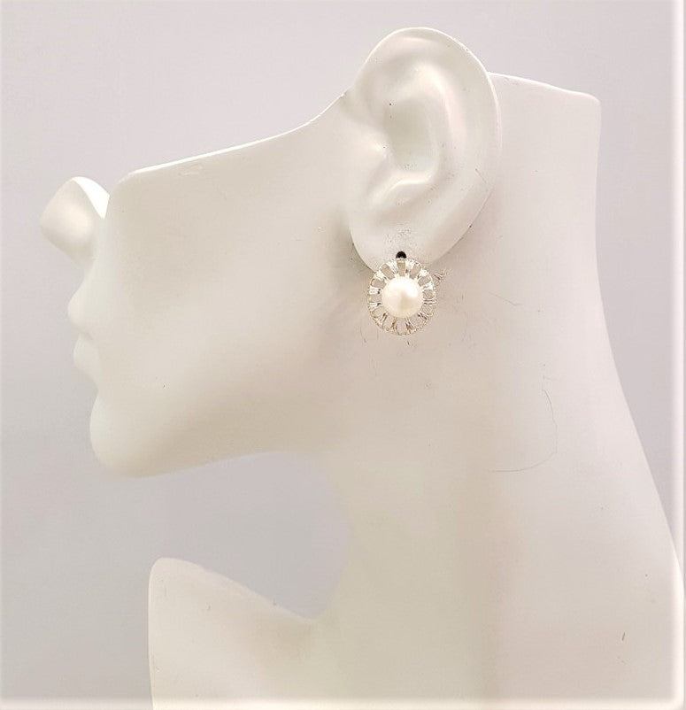 White Pearl framed with leaf Silver Stud Earrings