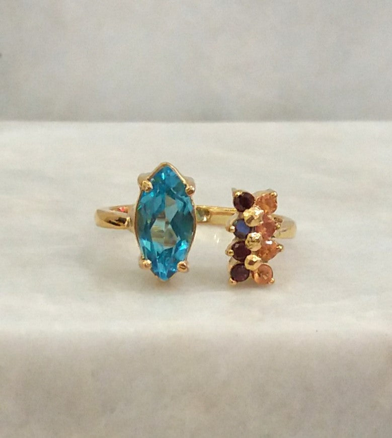 Blue Topaz with Citrines and Garnets Bypass Ring